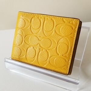 Coach Embossed Leather Bi-Fold Slim Wallet